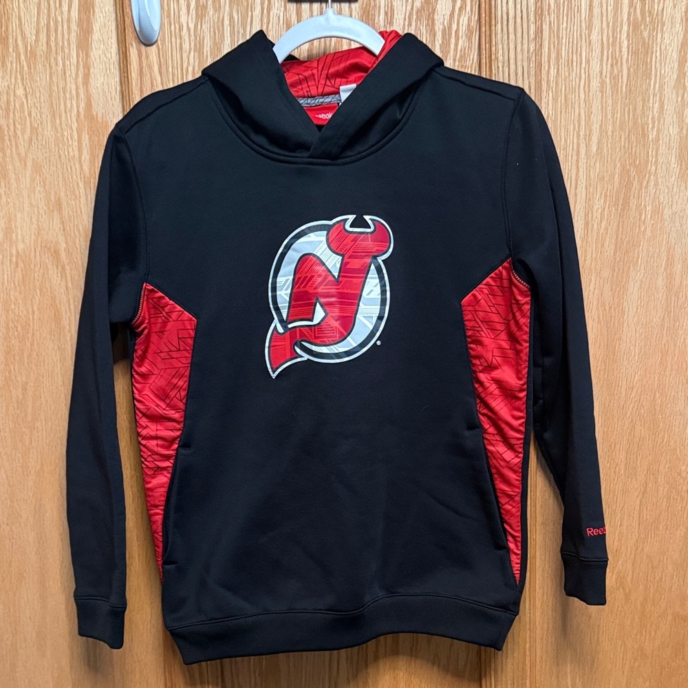 Reebok Black New Jersey Devils Hockey Hoodie with Red Accents and Logo

[118]